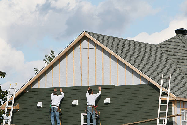 Professional Siding Contractor technician working in Owensville, OH